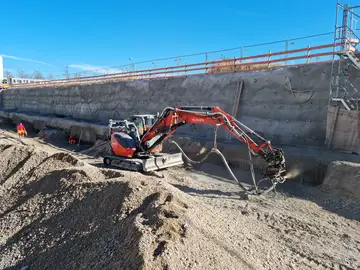Die Experten von Spesas setzten bei Baugrubensicherungen auf rückverankerten Spritzbeton zur Stabilisierung.